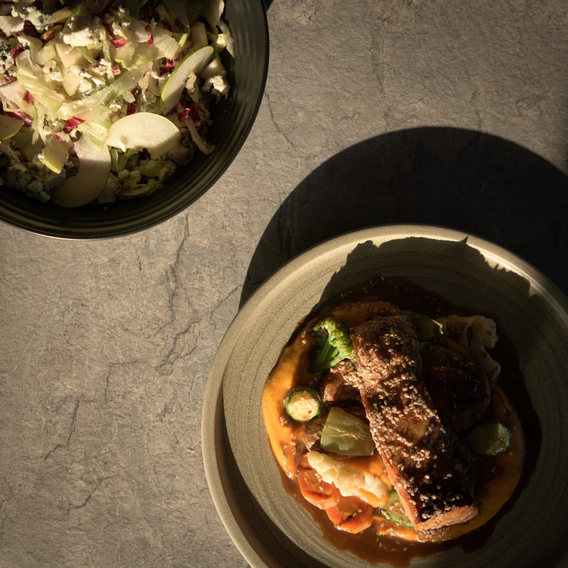 Overhead view of plated dishes at Litha